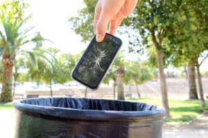 damaged phone going in dust bin