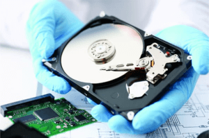 ITAD Partner Showing Hard Drive for Data Destruction