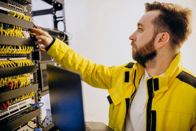 Man checking for IT assets to be disposed because his ITAD company has shut down